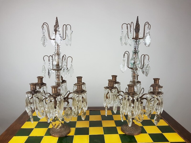 Pair of brass candlesticks and glass pendants