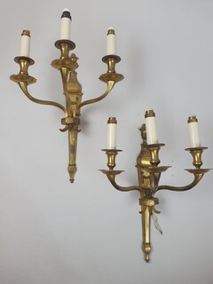 Pair of bronze and brass wall lights