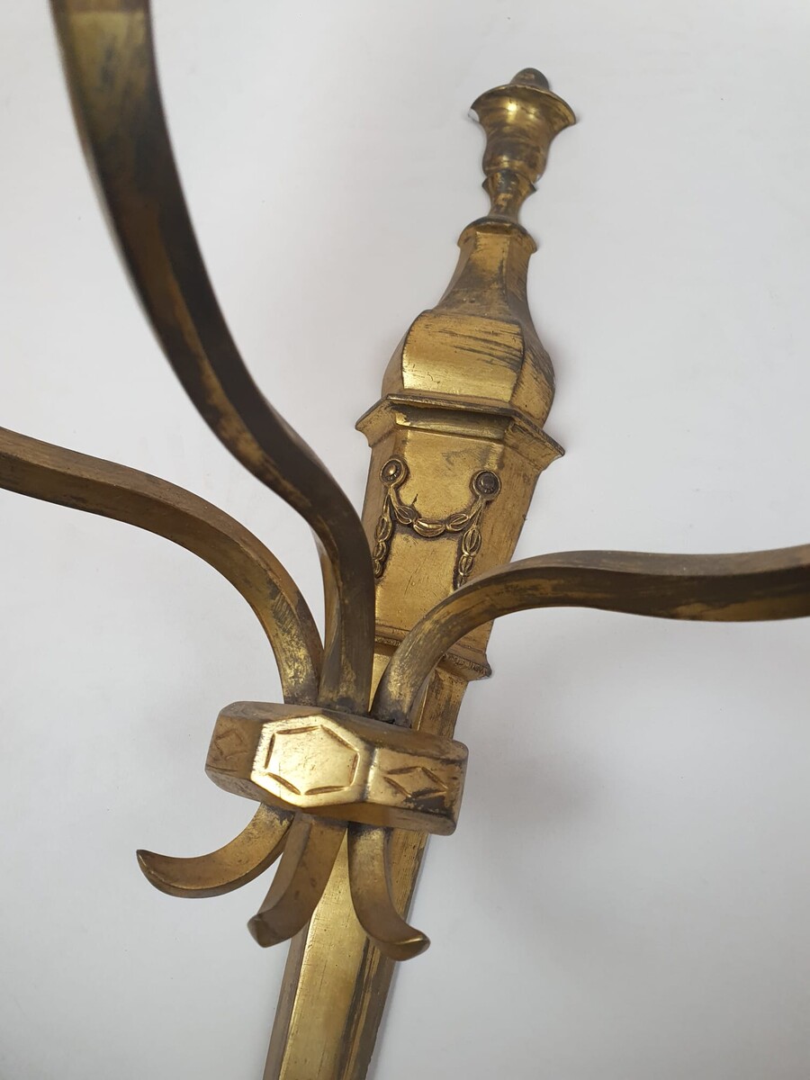 Pair of bronze and brass wall lights