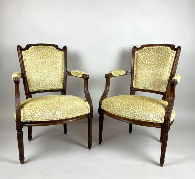 Pair of cabriolet armchairs in stained beech and new upholstery