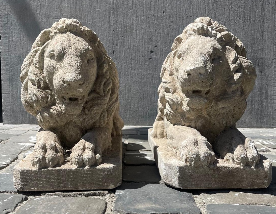 Pair of carved soft stone lions, 20th century