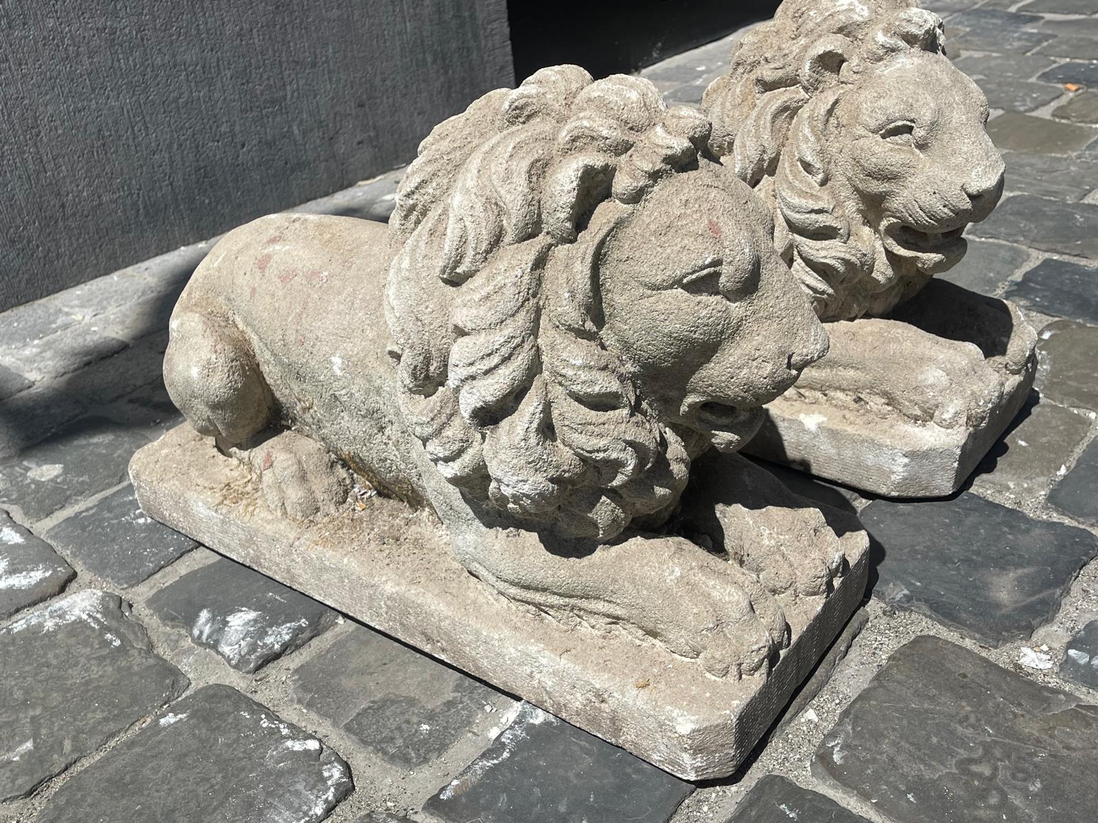 Pair of carved soft stone lions, 20th century