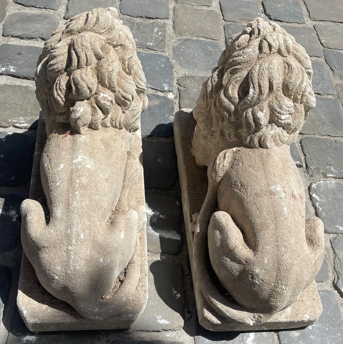 Pair of carved soft stone lions, 20th century