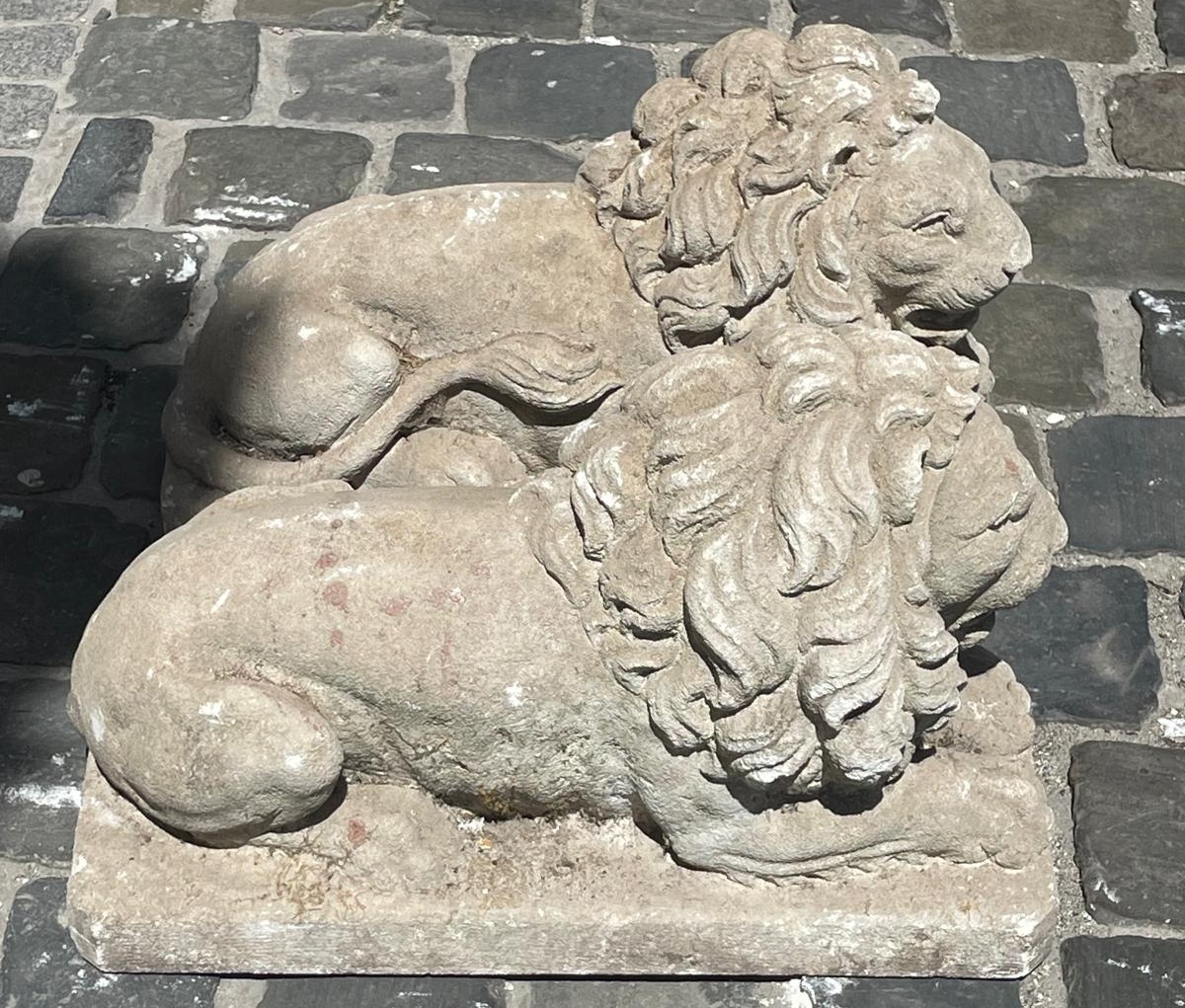 Pair of carved soft stone lions, 20th century