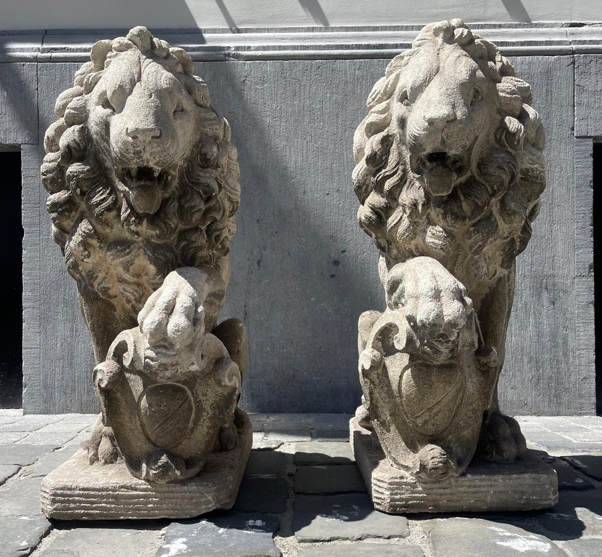 Pair of carved soft stone lions, early 20th century