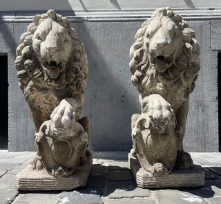 Pair of carved soft stone lions, early 20th century
