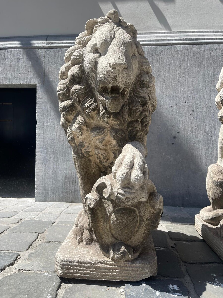 Pair of carved soft stone lions, early 20th century