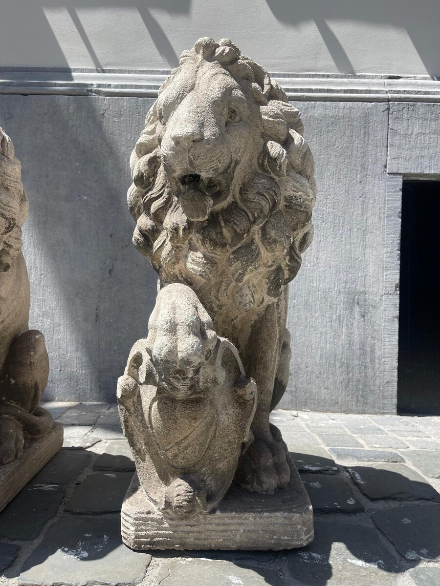 Pair of carved soft stone lions, early 20th century