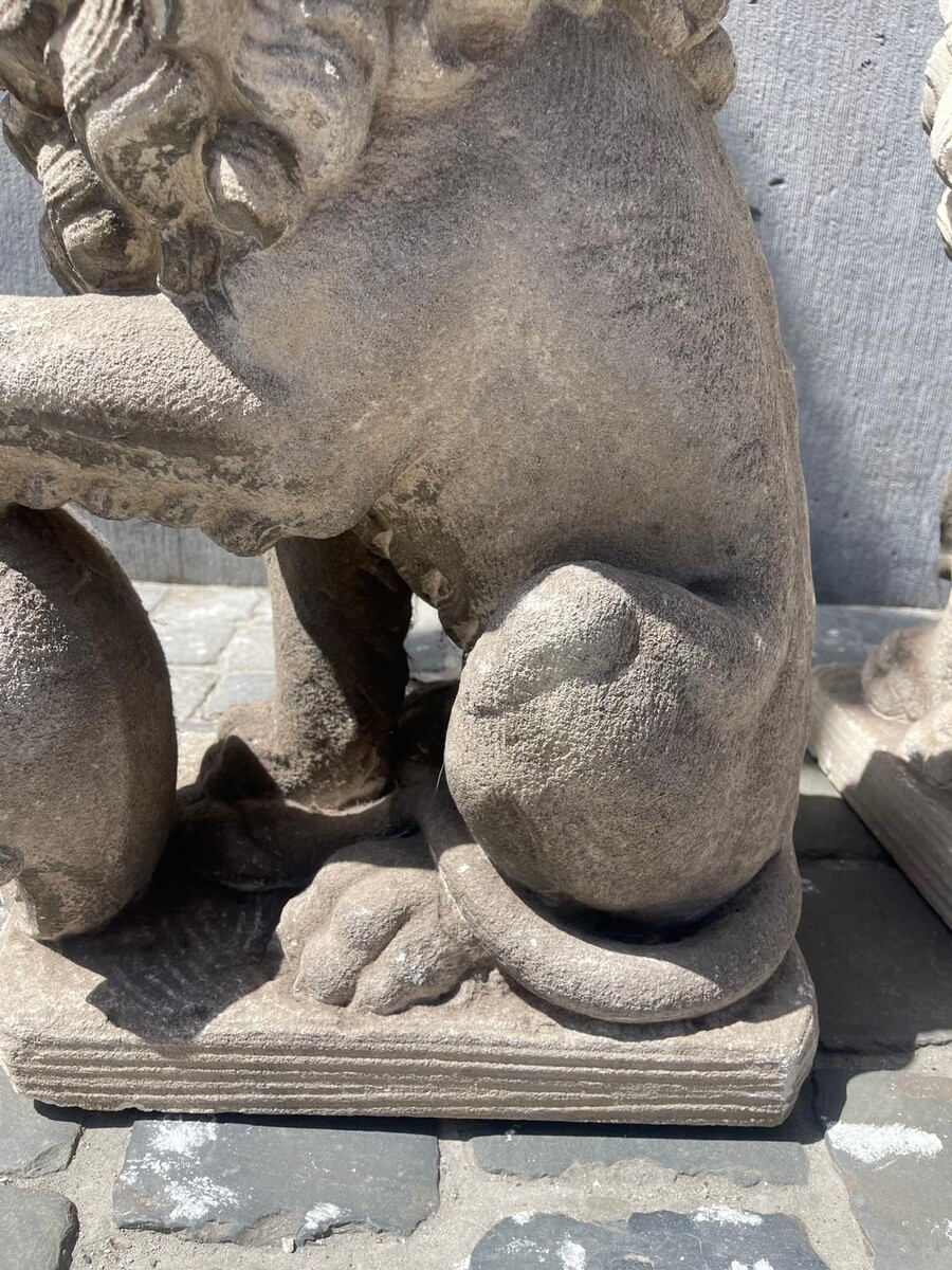 Pair of carved soft stone lions, early 20th century