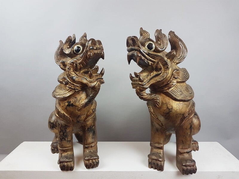 Pair of carved wooden Fô dogs, early 20th