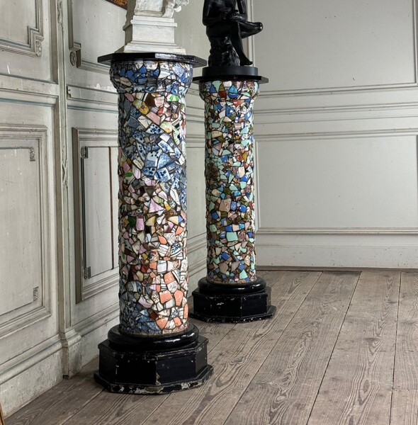 Pair of columns decorated with fragments of earthenware and porcelain, folk art circa 1900