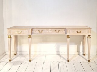 Pair of consoles in limed oak, marble shelf and gilded bronze shoes, 1940s