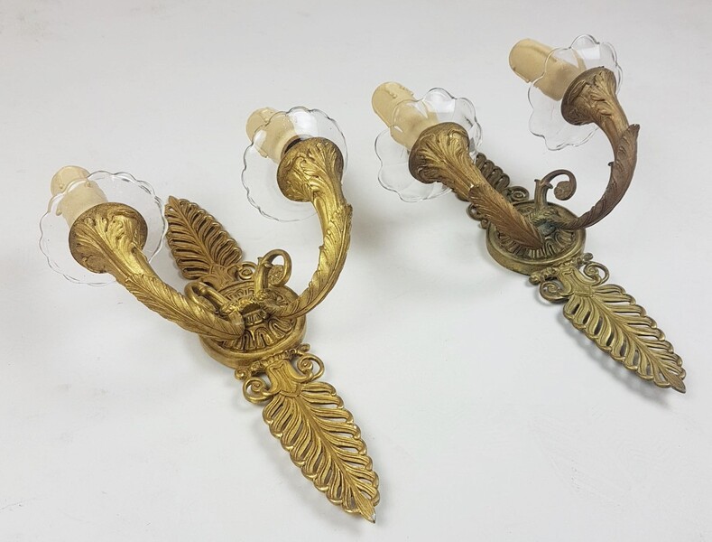 Pair of Empire period sconces in gilt bronze