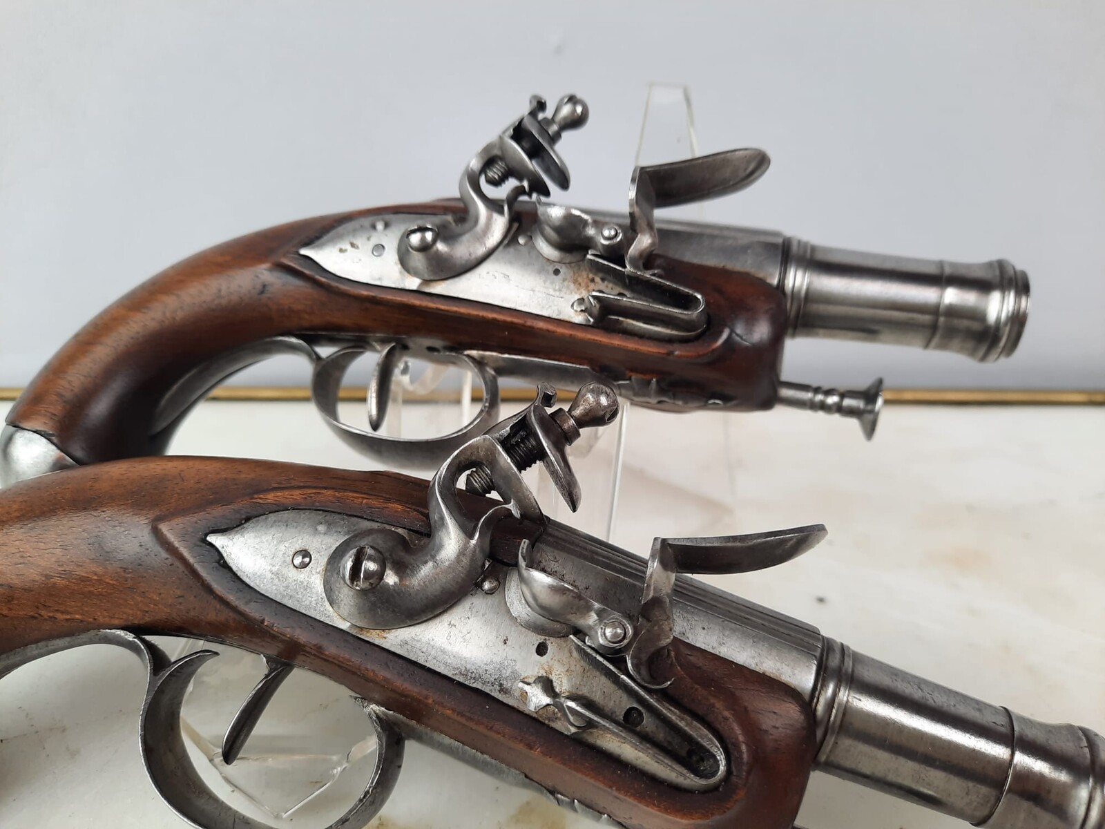 Pair of flintlock pistols, worked and blunderbuss barrels