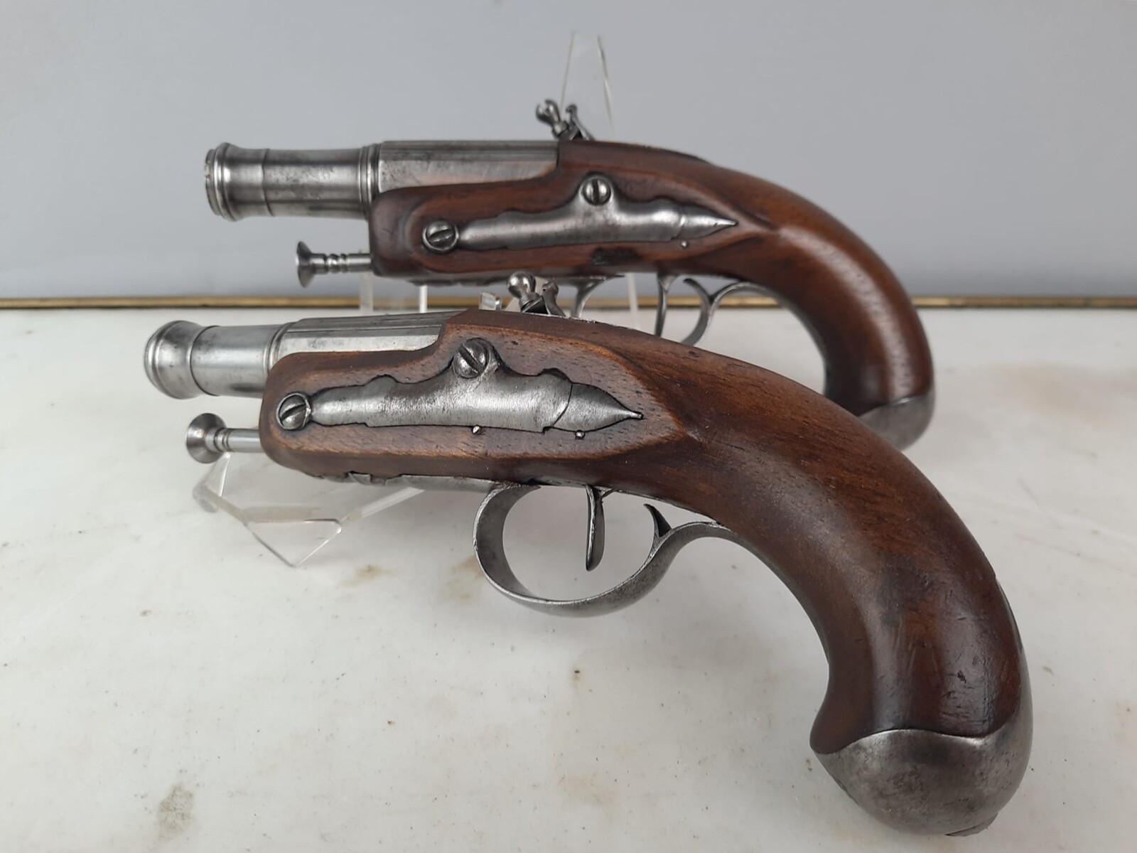Pair of flintlock pistols, worked and blunderbuss barrels