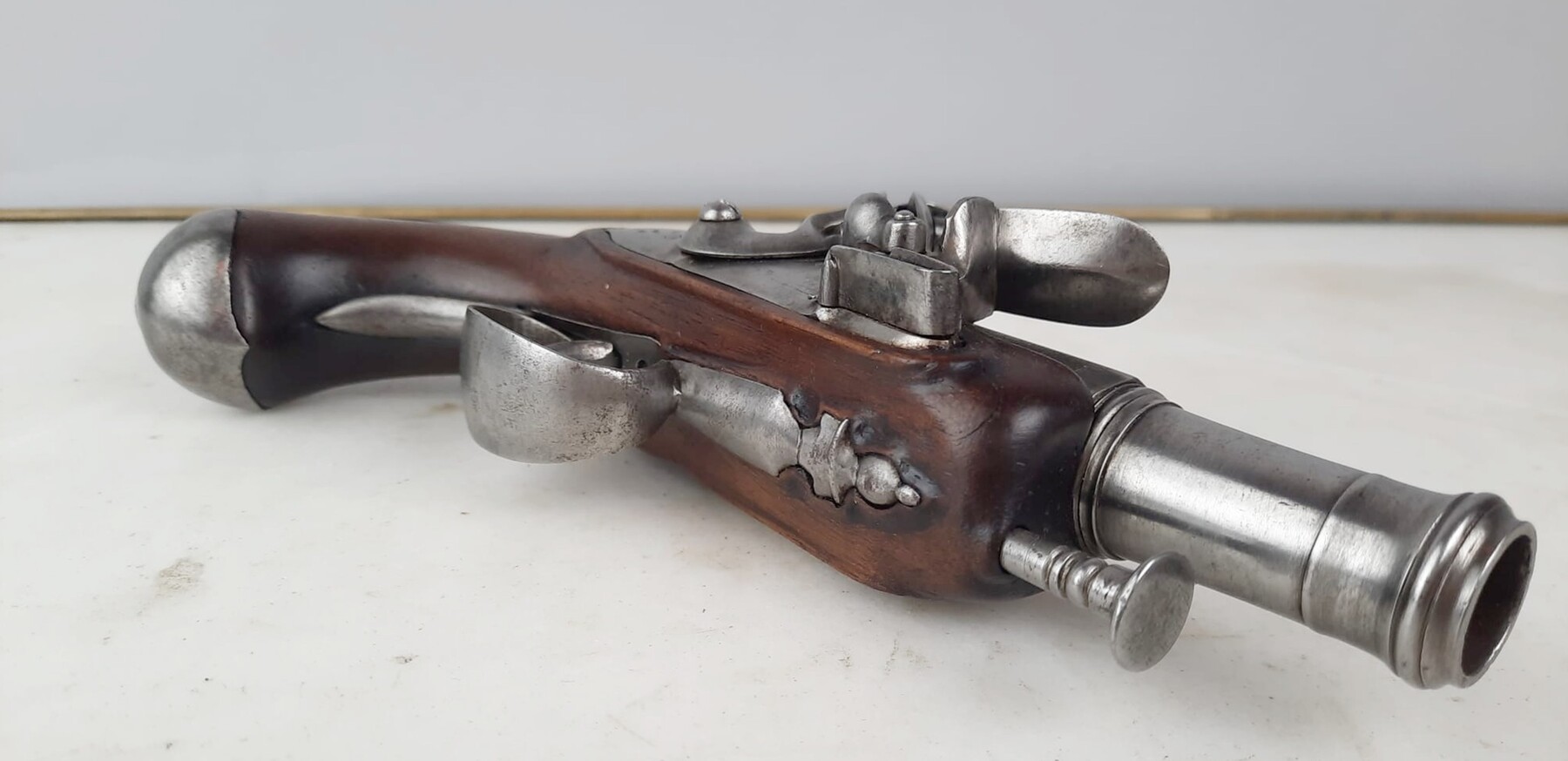 Pair of flintlock pistols, worked and blunderbuss barrels