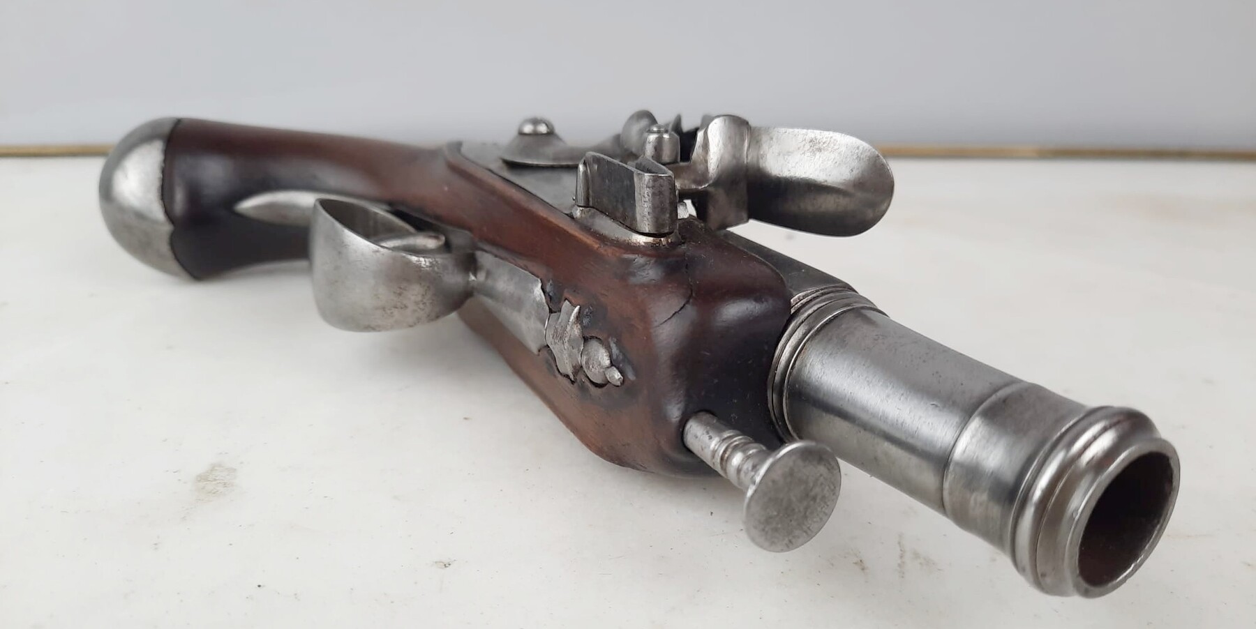 Pair of flintlock pistols, worked and blunderbuss barrels