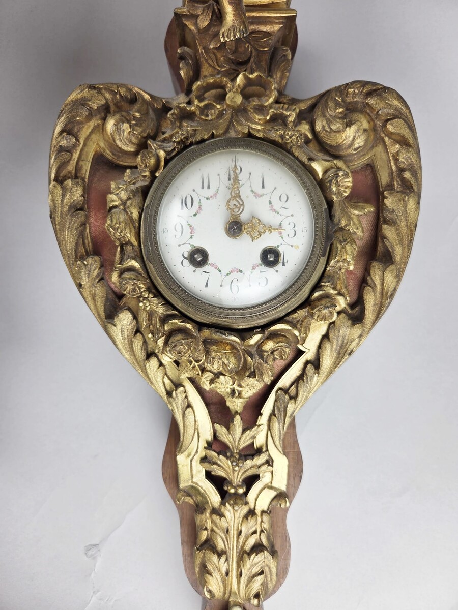 Pair of gilded bronze and wood cartels, early 20th century