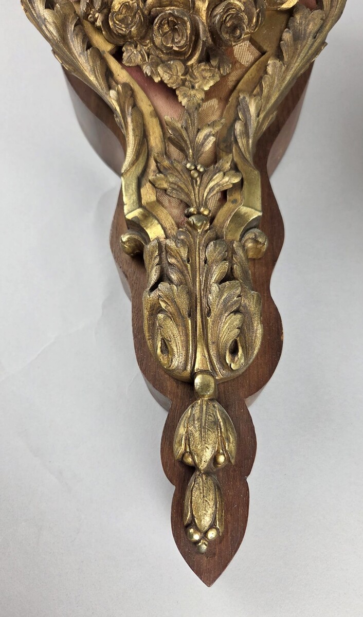 Pair of gilded bronze and wood cartels, early 20th century