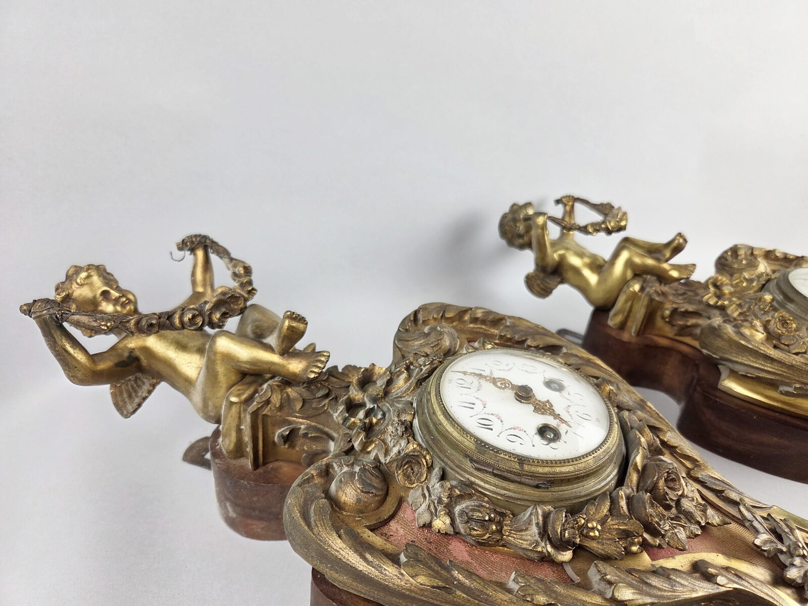 Pair of gilded bronze and wood cartels, early 20th century