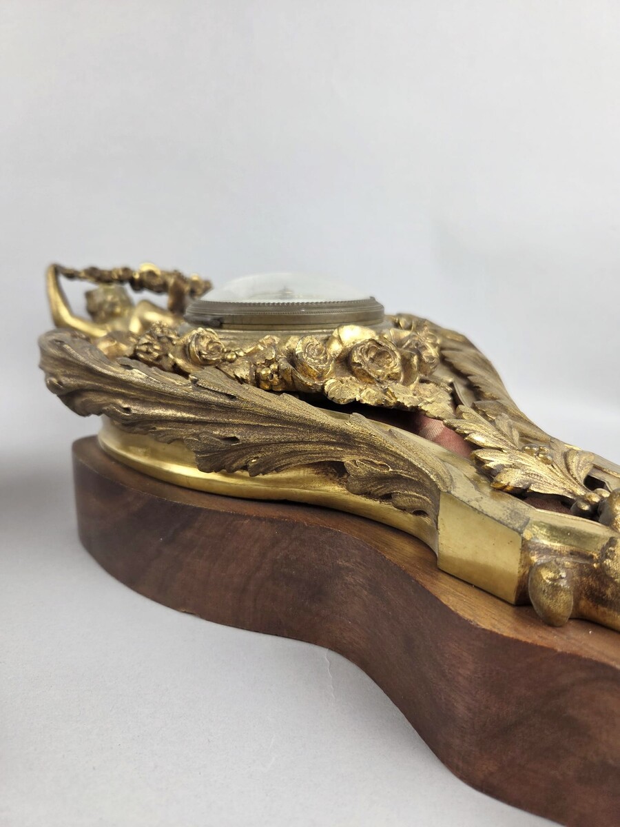 Pair of gilded bronze and wood cartels, early 20th century