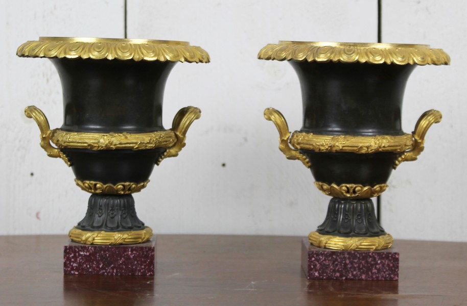 Pair of gilt bronze urns