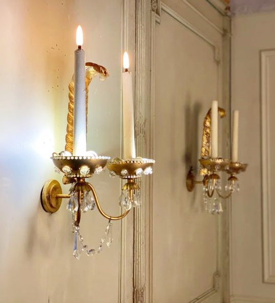 Pair of gilt metal sconces with tassels
