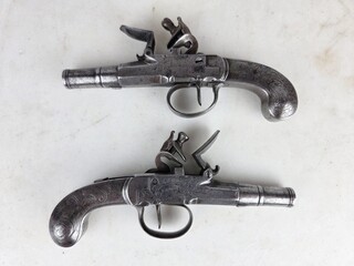 Pair of iron pistols, signed Seglas London, England circa 1740