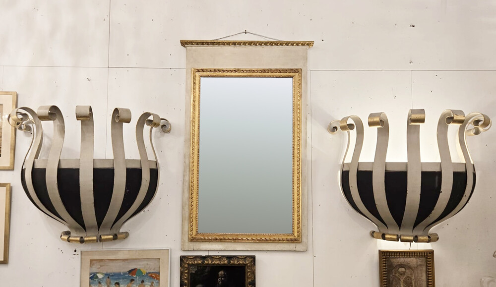 Pair of large wall sconces, in wrought iron and sheet metal, 20th 