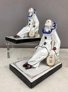Pair of Limoges porcelain bookends, monogrammed JK