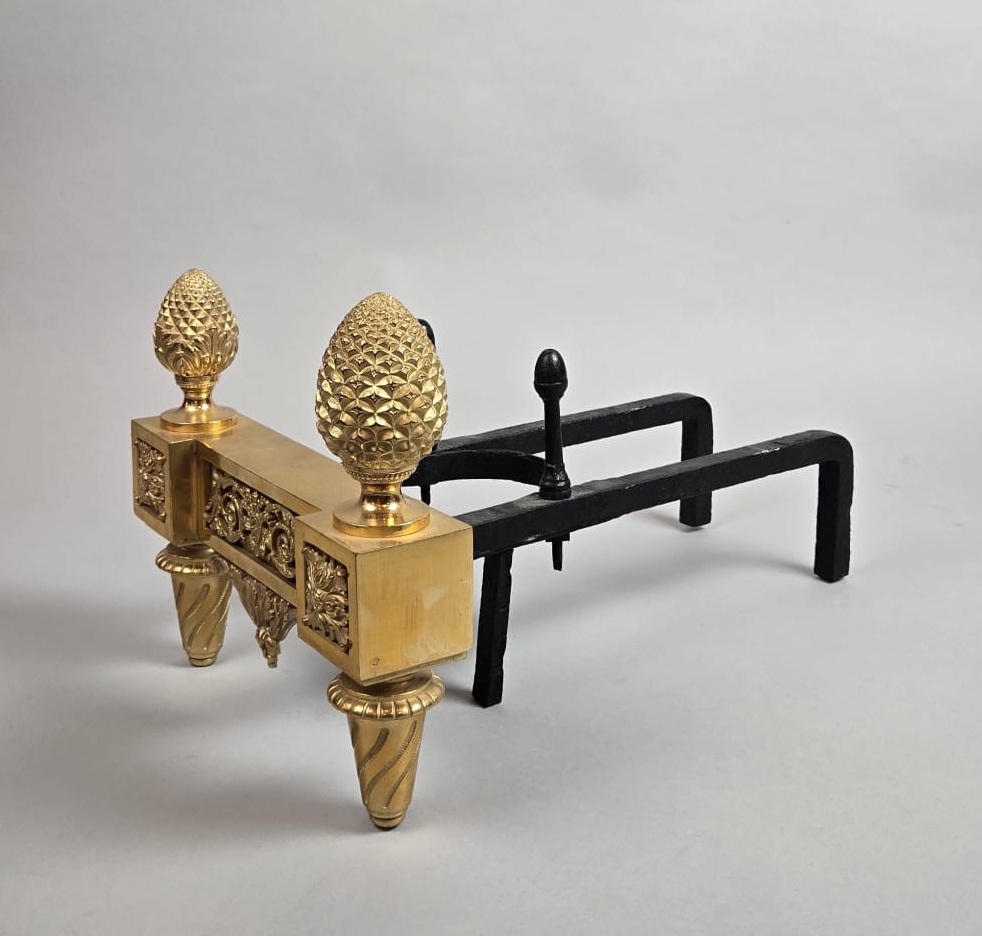 Pair of Louis XVI period gilt bronze andirons