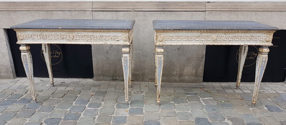 Pair of Louis XVI style console tables in patinated wood