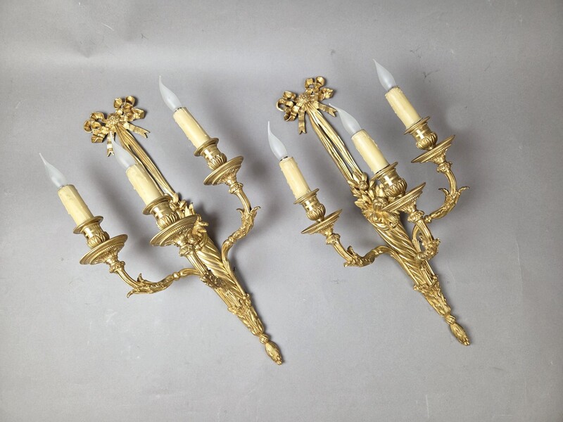Pair of Louis XVI style gilt bronze wall sconces, 19th