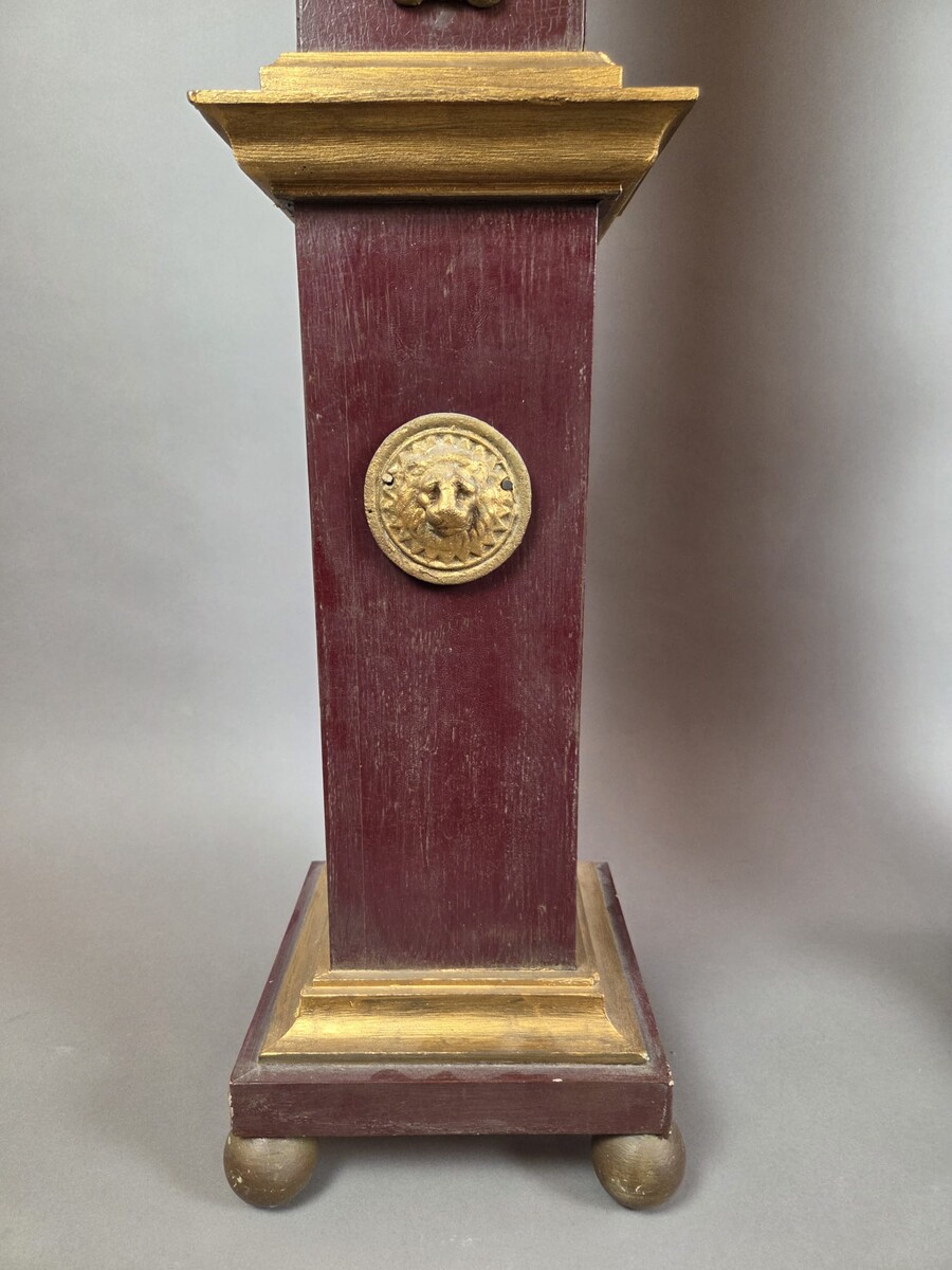 Pair of obelisks in painted wood with ormolu ornamentation, early 20th century