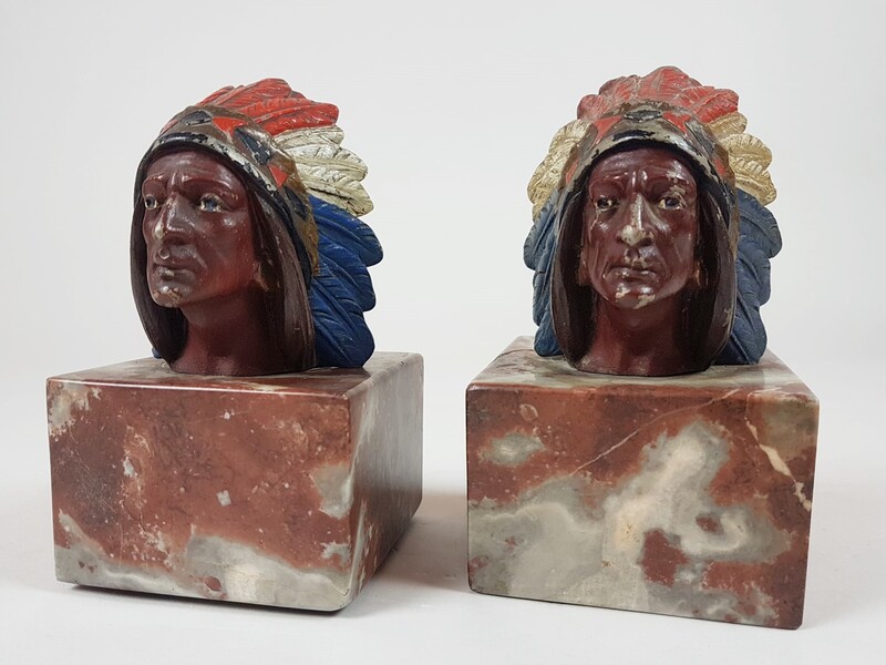Pair of polychrome lead bookstands on marble terrace