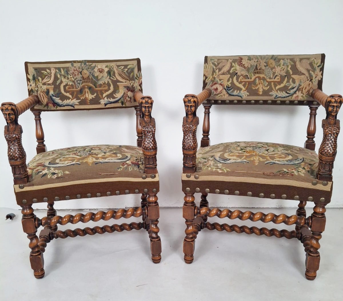 Pair of Renaissance-style armchairs, upholstered in tapestry, 19th century
