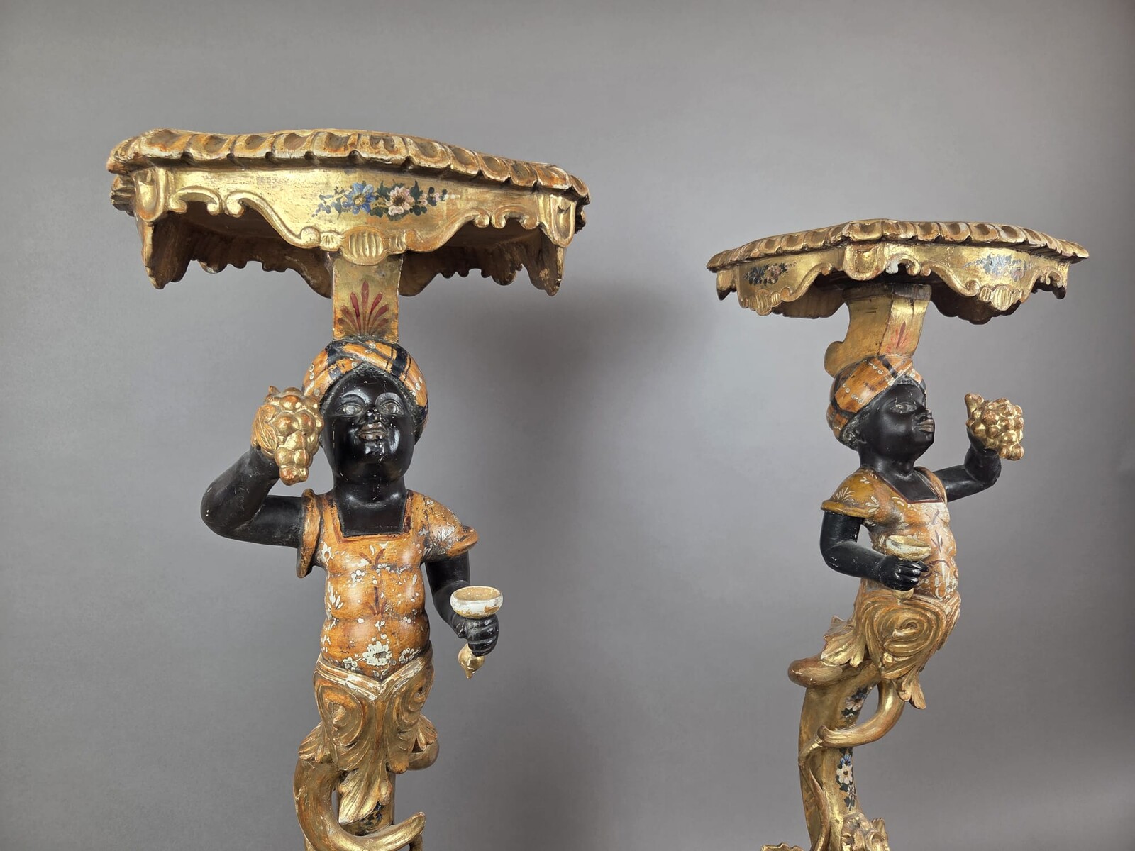 Pair of Venetian giltwood and polychrome sellettes, late 19th century