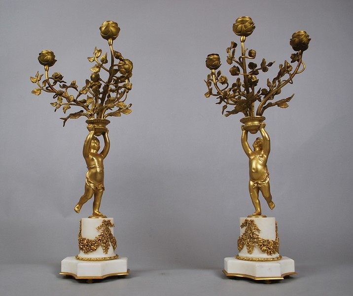 Pair of white marble and ormolu candelabras