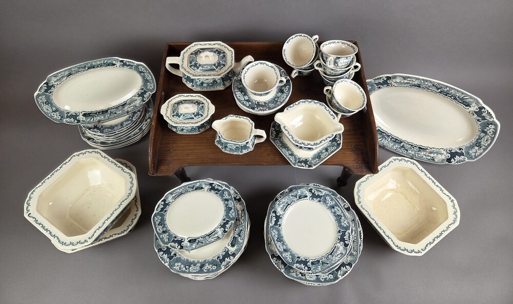 Part of a Maastricht earthenware dinner service, Victoria model, early 20th century, 66 pieces