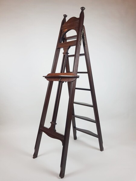 Patinated wooden easel, circa 1920