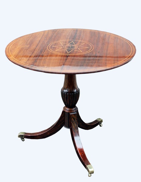 Pedestal table with tilting inlaid