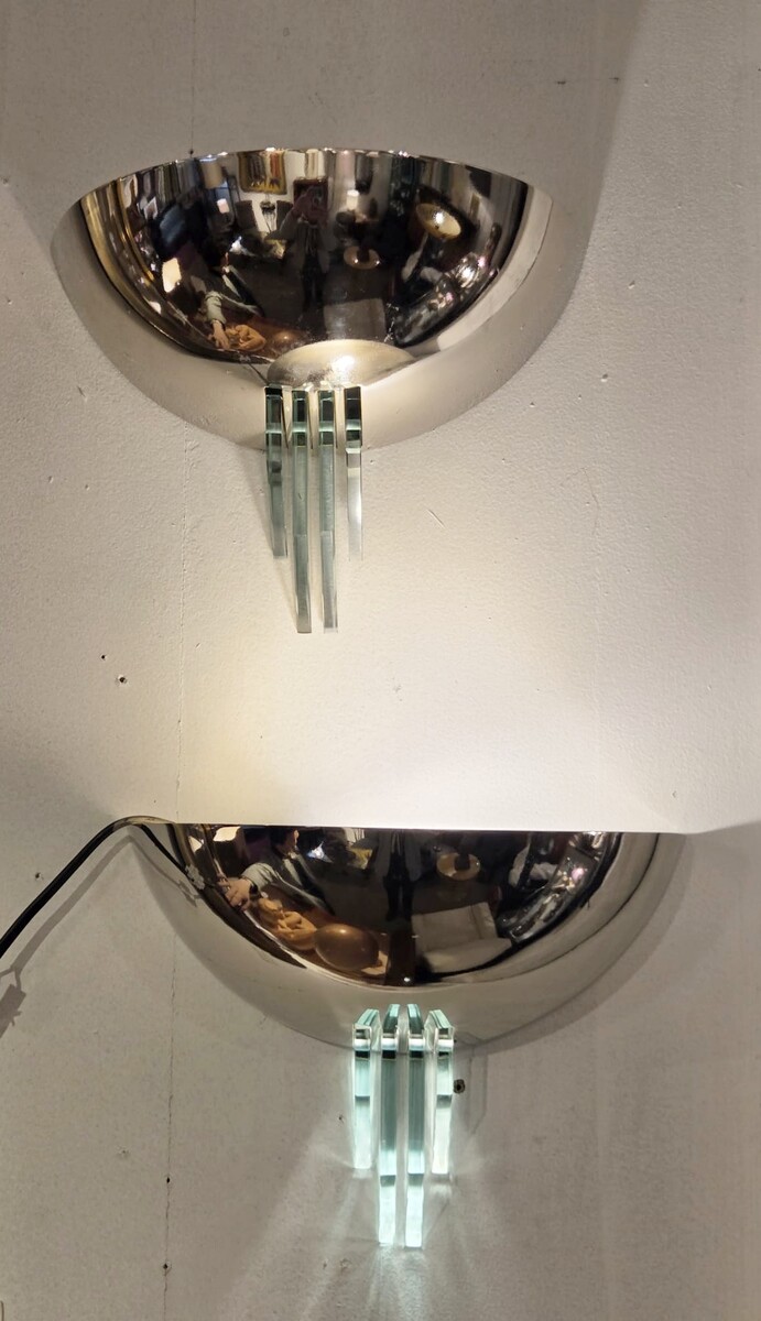 Pollin, pair of modernist sconces in chromed metal and glass, circa 1940