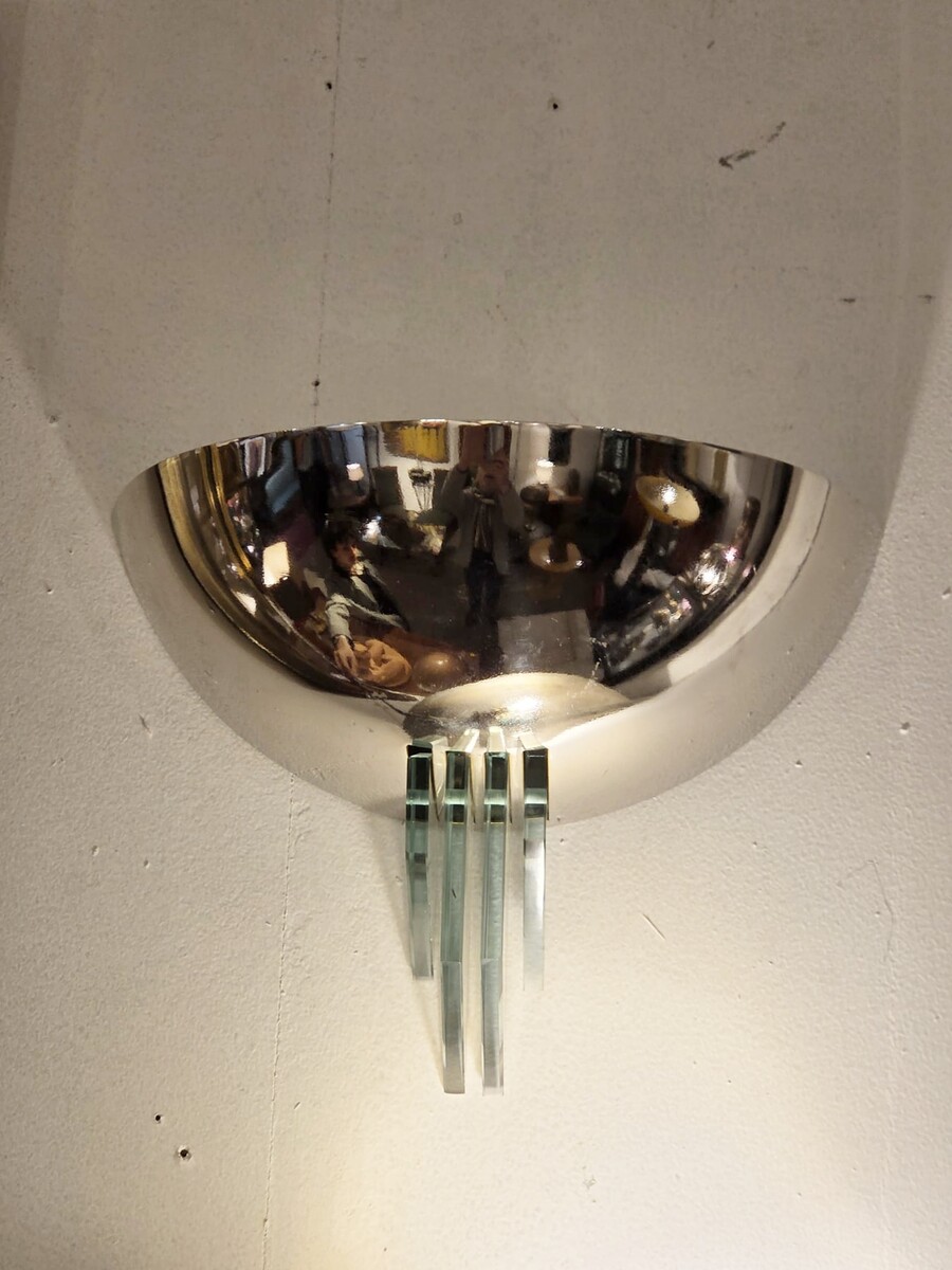Pollin, pair of modernist sconces in chromed metal and glass, circa 1940
