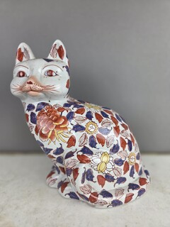 Polychrome Chinese porcelain cat, early 20th century