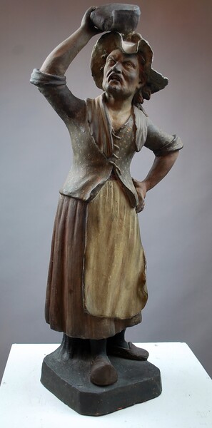 Polychromed terracotta sculpture, woman with a clog