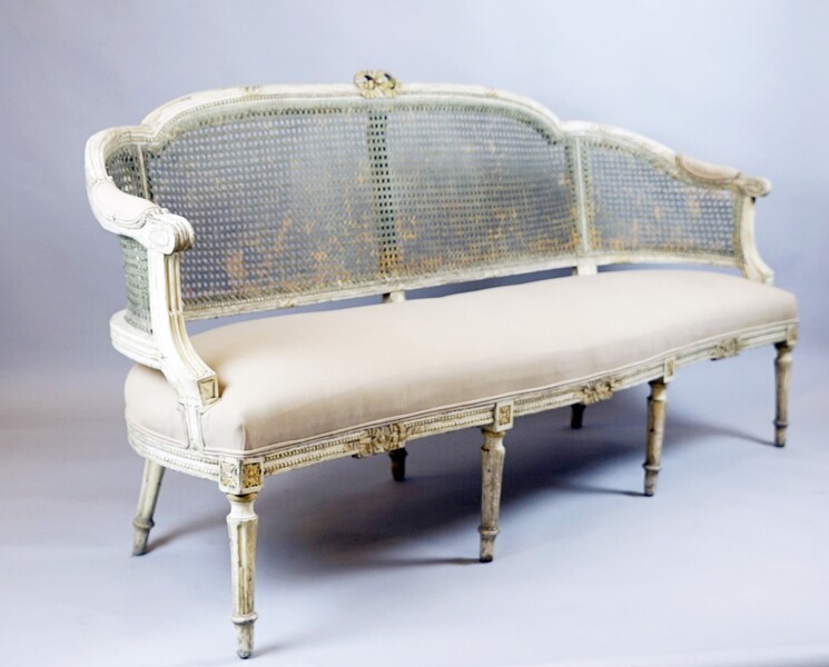pretty bench sofa, caned back, new beige upholstery, 18th.c. 