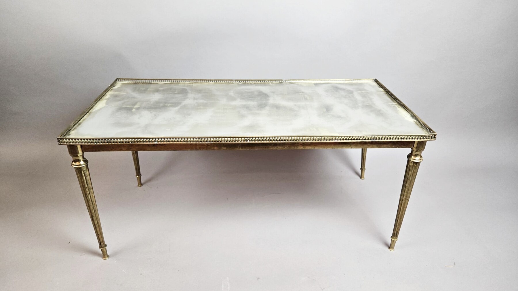 Rectangular coffee table in gilded brass