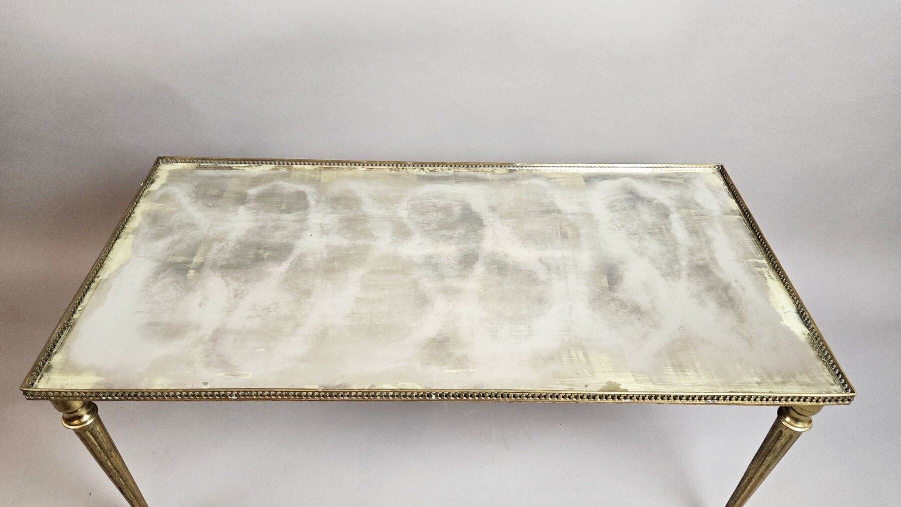 Rectangular coffee table in gilded brass