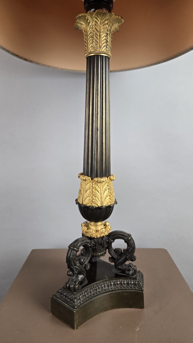 Restoration period lamp base in bronze with a black and gold patina