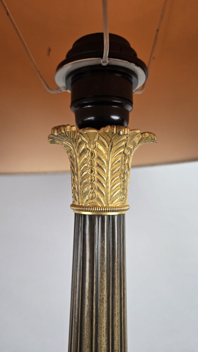 Restoration period lamp base in bronze with a black and gold patina